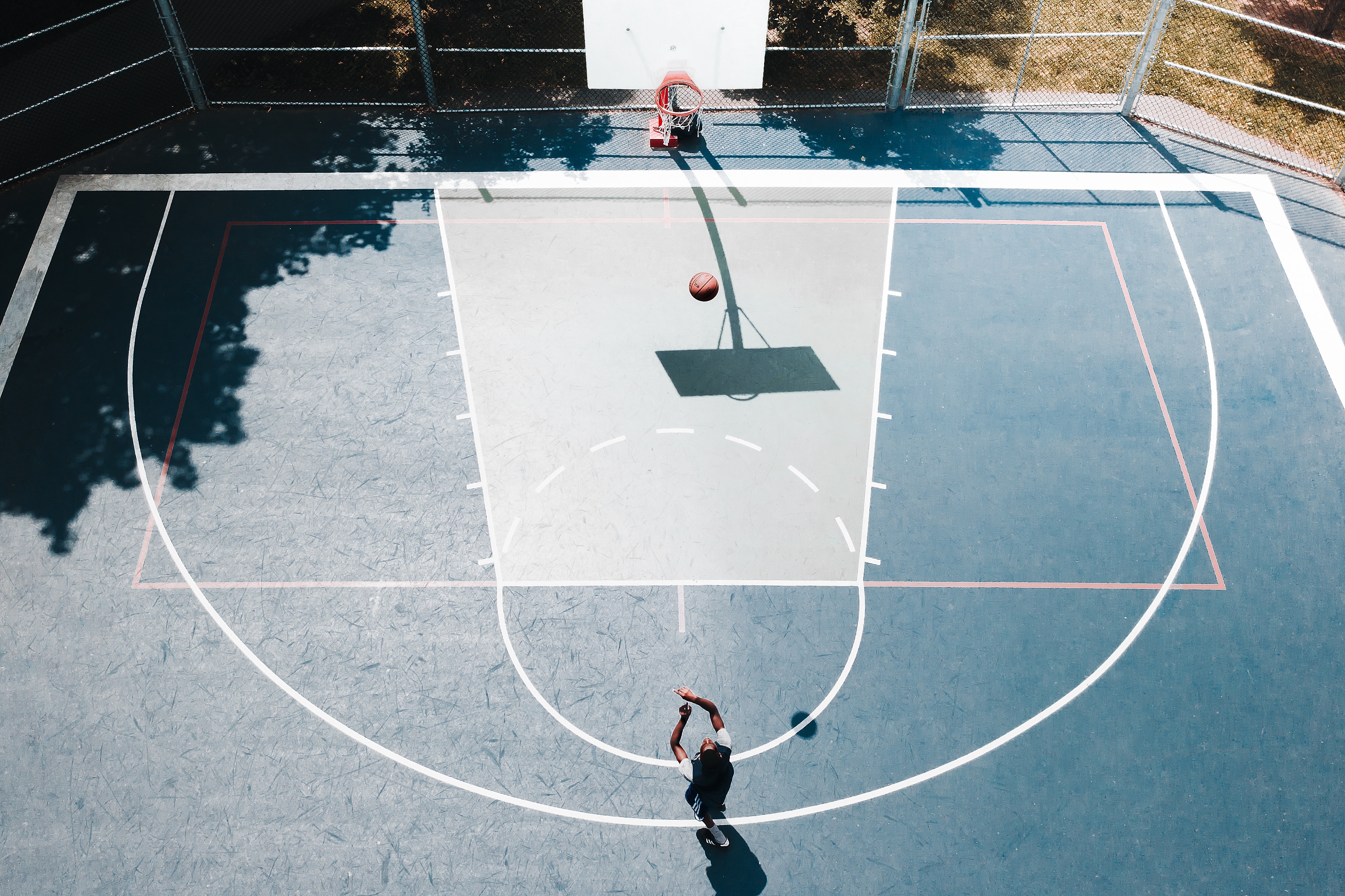 man-shooting-basketball